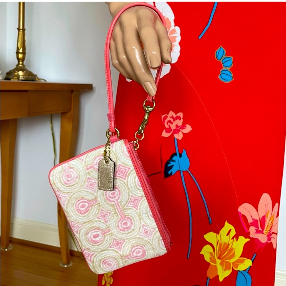 Coach Audrey Small Wristlet, in peach & khaki swirl- Used in excellent condition